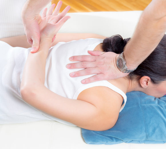 What is spinal manipulation?